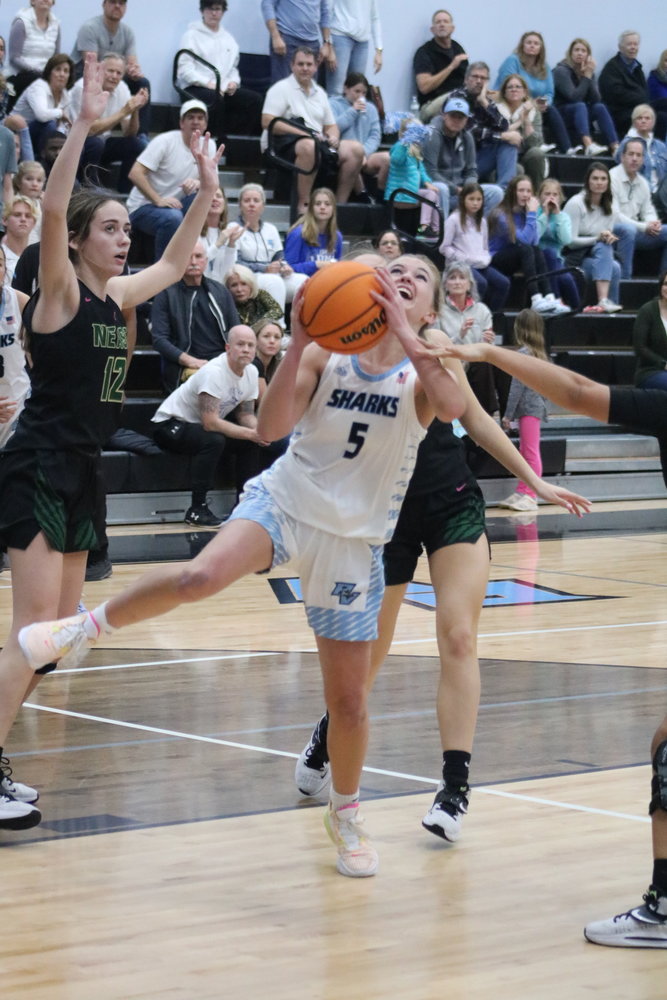 Ponte Vedra senior Reeghan Mayer slices through defenders on her way to the basket.